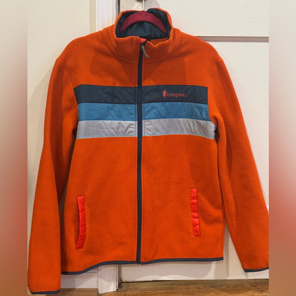 Cotopaxi Vibrant Orange Jacket with Blue and Gray Accents- barely used .